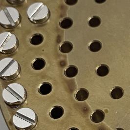 Tribofinition + Polissage plan sur tête de vis